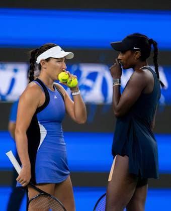 (241013) -- WUHAN, Oct. 13, 2024 -- Asia Muhammad Jessica Pegula (L) communicate during the women s doubles final match between Anna Danilina of Kazakhstan Irina Khromacheva of Russia and Asia Muhammad Jessica Pegula of the United States at the 2024 Wuhan Open tennis tournament in Wuhan, central China s Hubei Province, Oct. 13, 2024. ) (SP)CHINA-WUHAN-TENNIS-WUHAN OPEN-WOMEN S DOUBLES-FINAL(CN) HuxJingwen 