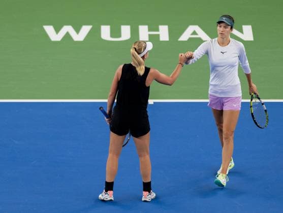 (241013) -- WUHAN, Oct. 13, 2024 -- Anna Danilina Irina Khromacheva (L) celebrate during the women s doubles final match between Anna Danilina of Kazakhstan Irina Khromacheva of Russia and Asia Muhammad Jessica Pegula of the United States at the 2024 Wuhan Open tennis tournament in Wuhan, central China s Hubei Province, Oct. 13, 2024. ) (SP)CHINA-WUHAN-TENNIS-WUHAN OPEN-WOMEN S DOUBLES-FINAL(CN) HuxJingwen 
