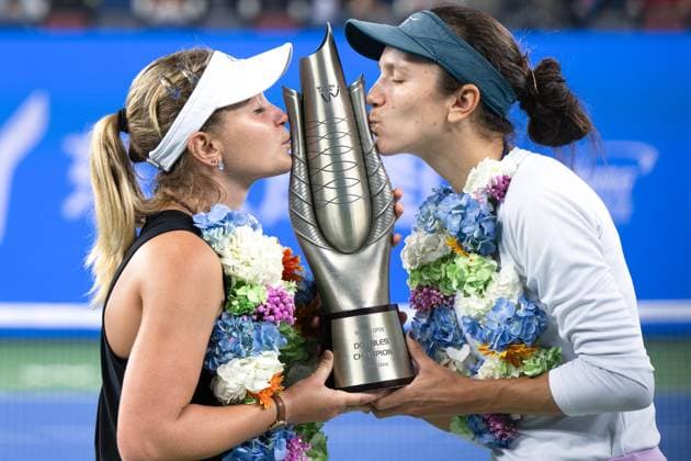 (241013) -- WUHAN, Oct. 13, 2024 -- Anna Danilina (R) Irina Khromacheva celebrate during the awarding ceremony of the women s doubles final match between Anna Danilina of Kazakhstan Irina Khromacheva of Russia and Asia Muhammad Jessica Pegula of the United States at the 2024 Wuhan Open tennis tournament in Wuhan, central China s Hubei Province, Oct. 13, 2024. ) (SP)CHINA-WUHAN-TENNIS-WUHAN OPEN-WOMEN S DOUBLES-FINAL(CN) XiaoxYijiu 