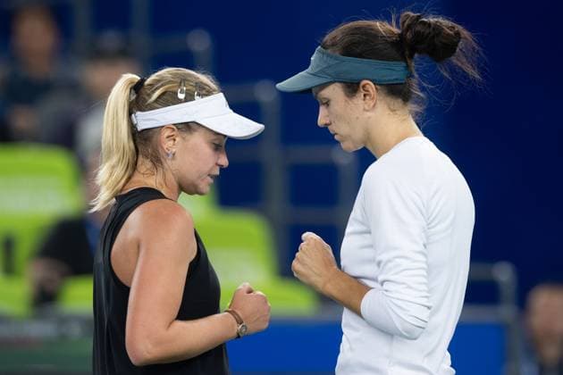 (241013) -- WUHAN, Oct. 13, 2024 -- Anna Danilina Irina Khromacheva (L) celebrate during the women s doubles final match between Anna Danilina of Kazakhstan Irina Khromacheva of Russia and Asia Muhammad Jessica Pegula of the United States at the 2024 Wuhan Open tennis tournament in Wuhan, central China s Hubei Province, Oct. 13, 2024. ) (SP)CHINA-WUHAN-TENNIS-WUHAN OPEN-WOMEN S DOUBLES-FINAL(CN) XiaoxYijiu 