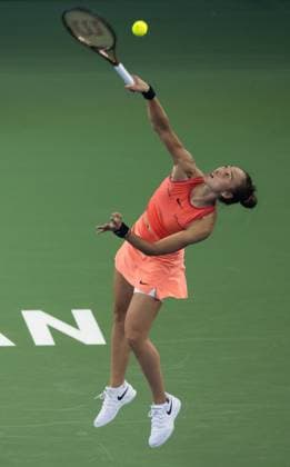 (241013) -- WUHAN, Oct. 13, 2024 -- Zheng Qinwen serves during the women s singles final match between Zheng Qinwen of China and Aryna Sabalenka of Belarus at the 2024 Wuhan Open tennis tournament in Wuhan, central China s Hubei Province, Oct. 13, 2024. ) (SP)CHINA-WUHAN-TENNIS-WUHAN OPEN-WOMEN S SINGLES-FINAL(CN) XiaoxYijiu 