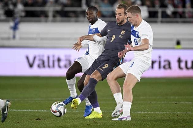 Glen Kamara (L) and Fredrik Jensen (R) of Finland vie with Harry Kane of England during the UEFA Nations League, League B - Group 2, football match between Finland and England at the Olympic Stadium in Helsinki, Finland, on October 13, 2024. Helsinki Finland LKFTJK20241013190549VHLP  Copyright: xAnttixAimo-Koivistox LKFTJK20241013190549VHLP