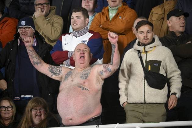An English fan cheers during the UEFA Nations League, League B - Group 2, football match between Finland and England at the Olympic Stadium in Helsinki, Finland, on October 13, 2024. Helsinki Finland LKFTJK20241013190240SNPE  Copyright: xMarkkuxUlanderx LKFTJK20241013190240SNPE