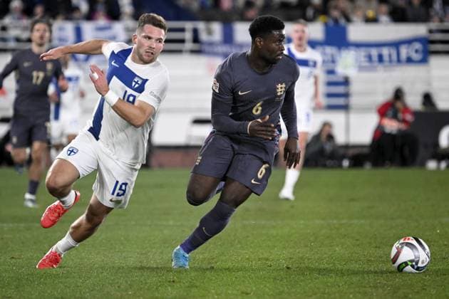 Benjamin Källman (L) of Finland vies with Marc Guehi of England during the UEFA Nations League, League B - Group 2, football match between Finland and England at the Olympic Stadium in Helsinki, Finland, on October 13, 2024. Helsinki Finland LKFTJK20241013191806LNDC  Copyright: xMarkkuxUlanderx LKFTJK20241013191806LNDC