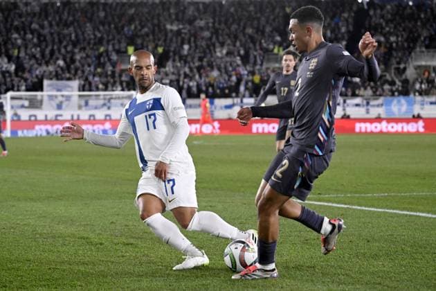 Nikolai Alho (L) of Finland vies with Trent Alexander-Arnold of England during the UEFA Nations League, League B - Group 2, football match between Finland and England at the Olympic Stadium in Helsinki, Finland, on October 13, 2024. Helsinki Finland LKFTJK20241013192851JGBJ  Copyright: xMarkkuxUlanderx LKFTJK20241013192851JGBJ