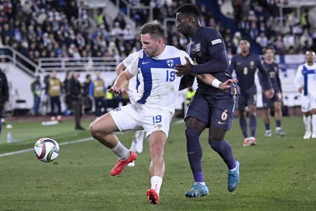 Benjamin Källman (L) of Finland vies with Marc Guehi of England during the UEFA Nations League, League B - Group 2, football match between Finland and England at the Olympic Stadium in Helsinki, Finland, on October 13, 2024. Helsinki Finland LKFTJK20241013194725RRHV  Copyright: xMarkkuxUlanderx LKFTJK20241013194725RRHV