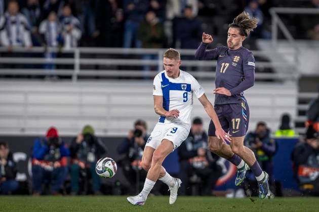 Fredrik Jensen of Finland and Jack Grealish of England during the UEFA Nations League Group B2 match between Finland and England at the Helsinki Olympic Stadium 13. October 2024 in Helsinki, Finland. (Mauri Forsblom Newspix24)  Copyright: xKallexParkkinenx NP24_02812373