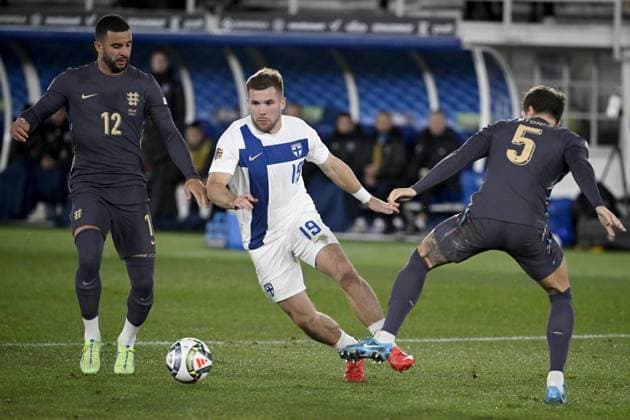Benjamin Källman (C) of Finland vies with Kyle Walker (L) and John Stones of England during the UEFA Nations League, League B - Group 2, football match between Finland and England at the Olympic Stadium in Helsinki, Finland, on October 13, 2024. Helsinki Finland LKFTJK20241013200659SIFY  Copyright: xAnttixAimo-Koivistox LKFTJK20241013200659SIFY