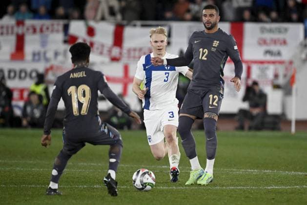Angel Gomes (L) and Kyle Walker (R) of England vie for the ball with Matti Peltola of Finland during the UEFA Nations League, League B - Group 2, football match between Finland and England at the Olympic Stadium in Helsinki, Finland, on October 13, 2024. Helsinki Finland LKFTJK20241013201947AGKP  Copyright: xAnttixAimo-Koivistox LKFTJK20241013201947AGKP