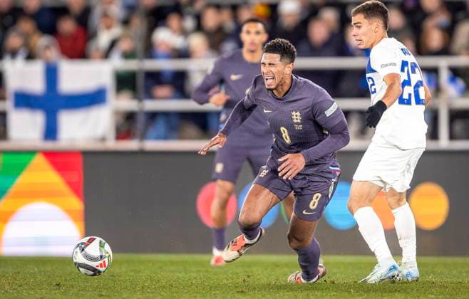 Jude Bellingham of England and. Leo Walta of Finland during the UEFA Nations League Group B2 match between Finland and England at the Helsinki Olympic Stadium 13. October 2024 in Helsinki, Finland. (Mauri Forsblom Newspix24)  Copyright: xKallexParkkinenx NP24_02812377
