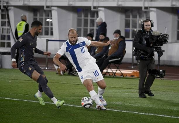 Teemu Pukki (R) of Finland vies for the ball with Kyle Walker of England during the UEFA Nations League, League B - Group 2, football match between Finland and England at the Olympic Stadium in Helsinki, Finland, on October 13, 2024. Helsinki Finland LKFTJK20241013204547PCDV  Copyright: xAnttixAimo-Koivistox LKFTJK20241013204547PCDV