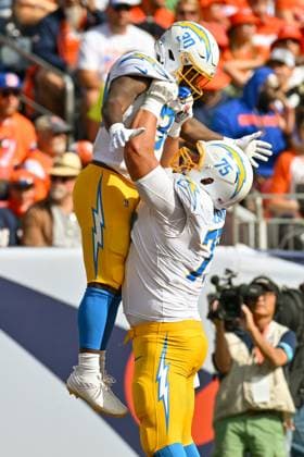 Sport Bilder des Tages DENVER, CO - OCTOBER 13: Chargers center Bradley Bozeman (75) lifts Chargers running back Kimani Vidal (30) after Kimani Vidal (30) scores in the second quarter of a game between the Denver Broncos and the Los Angeles Chargers at Empower Field at Mile High in Denver, CO on October 13, 2024. (Photo by Kevin Langley Icon Sportswire) NFL, American Football Herren, USA OCT 13 Chargers at Broncos EDITORIAL USE ONLY Icon1013202413