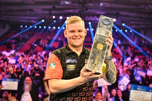 Sport Bilder des Tages 13th October 2024, Mattioli Arena, Leicester, England; 2024 PDC BoyleSports World Grand Prix Darts Final; Mike De Decker holds the Boyle Sports World Grand Prix trophy  ActionPlus12703150 GodfreyxPitt