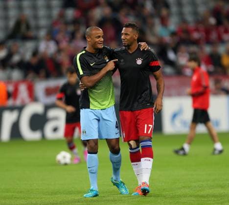 Soccer 2014: Bayern Munich vs Manchester City SEP 17 Sept. 17, 2014 - Munich, United Kingdom - Manchester City s Vincent Kompany greets Bayern Munich s Jerome Boateng..- Champions League Group E - Bayern Munich vs Manchester City - Allianz Arena - Germany - 17th September 2014 - Picture David Klein Sportimage. Munich Germany EDITORIAL USE ONLY Copyright: xx ZUMA-20140917_zaf_si1_011.jpg DavidxKleinx csmphoto959165