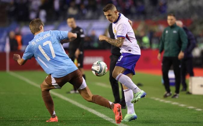 Belgium s Charles De Ketelaere and France s Lucas Digne fight for the ball during a soccer game between Belgian national soccer team Red Devils and France, match 4 (out of 6) in the League A Group 2 of the UEFA Nations League 2025 competition, Monday 14 October 2024 in Brussels. VIRGINIExLEFOUR  x102532136x