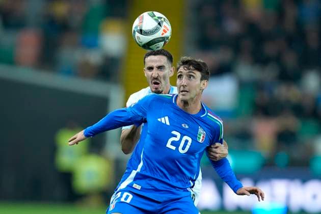 Andrea Cambiaso (Italy) and Dolev Haziza (Israel) battle for the ball, UEFA Nations League 2024 25 League A Group A2, Italy v Israel, Stadio Friuli, October 14, 2024, Udine, Italy.