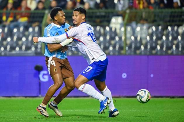 Belgium v France - UEFA Nations League 14 10 2024 BRUSSELS, BELGIUM - OCTOBER 14 : Openda Lois forward of Belgium, Saliba William defender of France in action during the UEFA Nations League tournament League A Phase Group A2 match between Belgium and France on October 14, 2024 in Brussels, Belgium, 14 10 2024 Brussels Belgium  Copyright: xVincentxKalutx