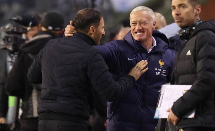 Belgium s head coach Domenico Tedesco and France s head coach Didier Deschamps pictured after a soccer game between Belgian national soccer team Red Devils and France, match 4 (out of 6) in the League A Group 2 of the UEFA Nations League 2025 competition, Monday 14 October 2024 in Brussels. VIRGINIExLEFOUR  x102536843x