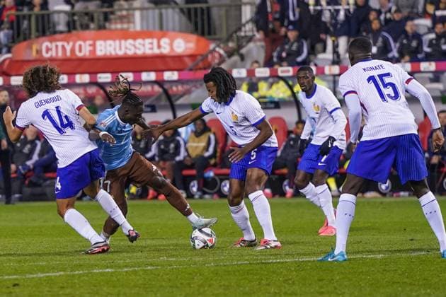 (241015) -- BRUSSELS, Oct. 15, 2024 -- Jeremy Doku (2nd L) of Belgium breaks through during the UEFA Nations League 2024 25 League A Group A2 football match between Belgium and France in Brussels, Belgium, Oct. 14, 2024. ) (SP)BELGIUM-BRUSSELS-FOOTBALL-UEFA NATIONS LEAGUE A-BELGIUM VS FRANCE PengxZiyang 