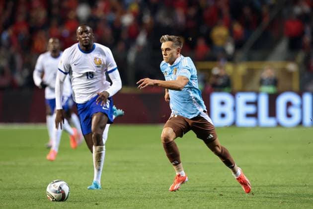 (241015) -- BRUSSELS, Oct. 15, 2024 -- Leandro Trossard (R) of Belgium vies for the ball during the UEFA Nations League 2024 25 League A Group A2 football match between Belgium and France in Brussels, Belgium, Oct. 14, 2024. ) (SP)BELGIUM-BRUSSELS-FOOTBALL-UEFA NATIONS LEAGUE A-BELGIUM VS FRANCE ZhaoxDingzhe 