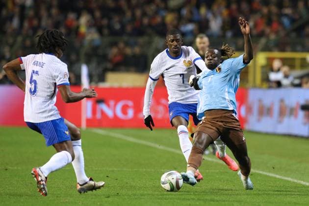 (241015) -- BRUSSELS, Oct. 15, 2024 -- Jeremy Doku (R) of Belgium vies with Ousmane Dembele of France during the UEFA Nations League 2024 25 League A Group A2 football match between Belgium and France in Brussels, Belgium, Oct. 14, 2024. ) (SP)BELGIUM-BRUSSELS-FOOTBALL-UEFA NATIONS LEAGUE A-BELGIUM VS FRANCE ZhaoxDingzhe 