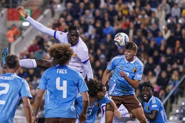 (241015) -- BRUSSELS, Oct. 15, 2024 -- Charles De Ketelaere (top R) of Belgium vies for a header during the UEFA Nations League 2024 25 League A Group A2 football match between Belgium and France in Brussels, Belgium, Oct. 14, 2024. ) (SP)BELGIUM-BRUSSELS-FOOTBALL-UEFA NATIONS LEAGUE A-BELGIUM VS FRANCE PengxZiyang 