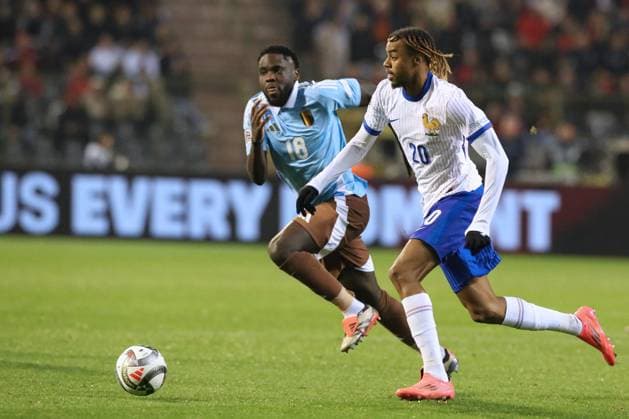 (241015) -- BRUSSELS, Oct. 15, 2024 -- Bradley Barcola (R) of France vies with Orel Mangala of Belgium during the UEFA Nations League 2024 25 League A Group A2 football match between Belgium and France in Brussels, Belgium, Oct. 14, 2024. ) (SP)BELGIUM-BRUSSELS-FOOTBALL-UEFA NATIONS LEAGUE A-BELGIUM VS FRANCE ZhaoxDingzhe 