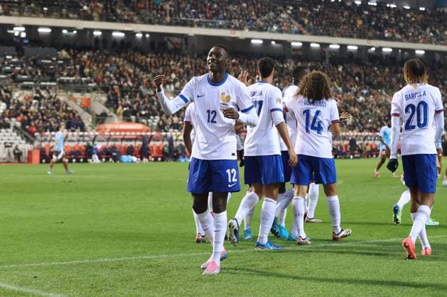 (241015) -- BRUSSELS, Oct. 15, 2024 -- Randal Kolo Muani (front) of France celebrates scoring during the UEFA Nations League 2024 25 League A Group A2 football match between Belgium and France in Brussels, Belgium, Oct. 14, 2024. ) (SP)BELGIUM-BRUSSELS-FOOTBALL-UEFA NATIONS LEAGUE A-BELGIUM VS FRANCE ZhaoxDingzhe 