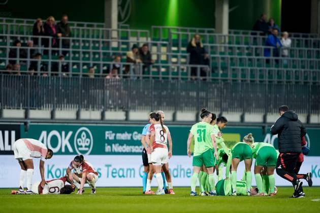 Wolfsburg, Germany, October 17th 2024: Melchie Dumornay (6 Olympique Lyonnais) and Alexandra Popp (11 VfL Wolfsburg) injured on the ground during the UEFA Womens Champions League Group stage football match between VfL Wolfsburg and Olympique Lyonnais at AOK Stadion in Wolfsburg, Germany. (Daniela Porcelli SPP) Copyright: xDanielaxPorcellix xSPPx spp-en-DaPoSp-20241017-_DP15228
