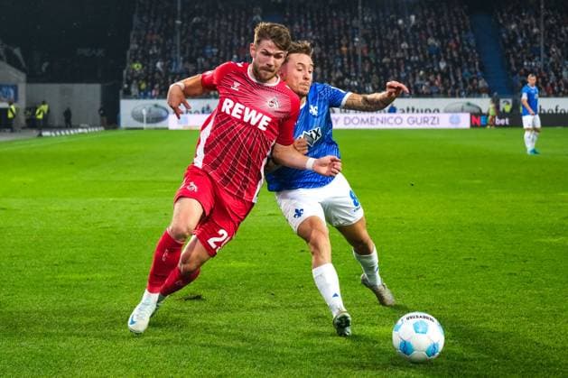 Jan Thielmann (1. FC Koeln, 29) im Zweikampf mit Luca Marseiler (SV Darmstadt 98, 08), GER, SV Darmstadt 98 vs. 1. FC Koeln, Fussball, 2. Bundesliga, 9. Spieltag, Saison 2024 2025, 18.10.2024. DFL REGULATIONS PROHIBIT ANY USE OF PHOTOGRAPHS as IMAGE SEQUENCES and or QUASI-VIDEO. GER, SV Darmstadt 98 vs. 1. FC Koeln, Fussball, 2. Bundesliga, 9. Spieltag, Saison 2024 2025, 18.10.2024. Darmsatdt