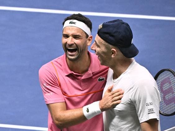 STOCKHOLM, SWEDEN 20241019 Grigor Dimitrov (L) of Bulgaria laughs with Tallon Griekspoor of the Netherlands after winning their semi final BNP Paribas Nordic Open ATP, Tennis Herren tennis singles match at the Royal Tennis Hall, in Stockholm, Sweden, on Oct. 19, 2024. STOCKHOLM SWEDEN x10090x