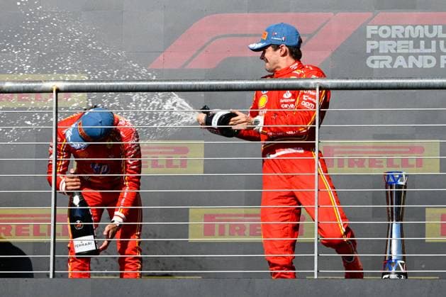 AUSTIN, TX - OCTOBER 20: Scuderia Ferrari driver Charles Leclerc (16) of Monaco douses Scuderia Ferrari driver Carlos Sainz (55) of Spain with champagne as they celebrate the podium finish following the Formula 1 Pirelli United States Grand Prix on October 20, 2024, at Circuit of The Americas in Austin, Texas. (Photo by Ken Murray Icon Sportswire) AUTO: OCT 20 F1 Pirelli United States Grand Prix EDITORIAL USE ONLY Icon241020016