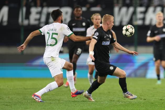 SOCCER - UEFA CL, Sturm vs Sporting KLAGENFURT,AUSTRIA,22.OCT.24 - SOCCER - UEFA Champions League, SK Sturm Graz vs Sporting CP. Image shows Goncalo Inacio (Sporting Lissabon) and Mika Biereth (Sturm).  GEPAxpictures xChrisxBauer