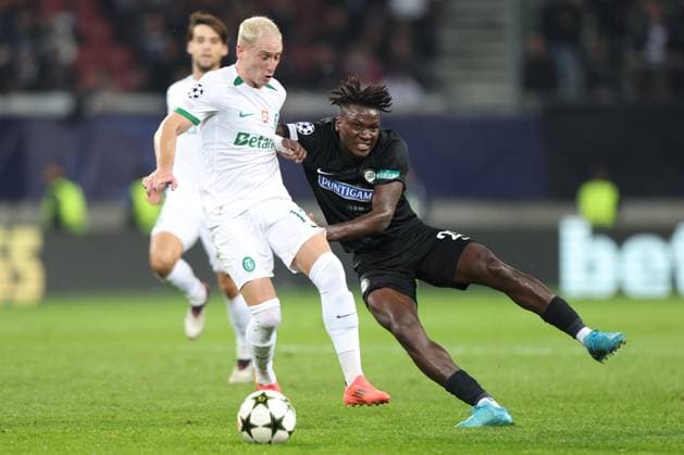 SOCCER - UEFA CL, Sturm vs Sporting KLAGENFURT,AUSTRIA,22.OCT.24 - SOCCER - UEFA Champions League, SK Sturm Graz vs Sporting CP. Image shows Nuno Santos (Sporting Lissabon) and Seedy Jatta (Sturm).  GEPAxpictures xChrisxBauer