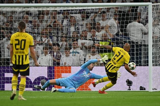 Madrid, Estadio Santiago Bernabeu, 22.10.24, GER, Herren, UEFA Champions League, Saison 2024-2025, Real Madrid - Borussia Dortmund Bild: Donyell MALEN (Dortmund) macht das Tor zum 0:1 Only for editorial use! UEFA regulations prohibit any use of photographs as image sequences and or quasi-video. Spanien