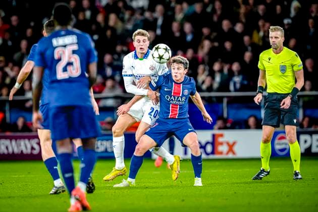 PSV Eindhoven midfielder Guus Til, Paris Saint-Germain midfielder Joao Neves, during the match Paris - PSV at the Parc des Princes Stadium for the UEFA Champions League - League phase - Matchday 3 season 2023-2024 in PARIS, France on 22 oktober 2024 (photo by Geert van Erven - EYE4images DeFodi Images) not used in POL SRB CRO FRA GBR NED ITA USA Defodi-746_196499