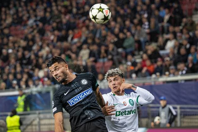 SOCCER - UEFA CL, Sturm vs Sporting KLAGENFURT,AUSTRIA,22.OCT.24 - SOCCER - UEFA Champions League, SK Sturm Graz vs Sporting CP. Image shows Jusuf Gazibegovic (Sturm) and Maxi Araujo (Sporting Lissabon).  GEPAxpictures xMatthiasxTrinkl