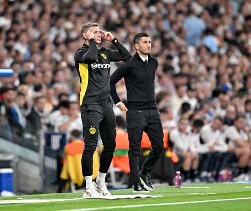 22.10.2024, Fussball UEFA Champions League 2024 2025, 3.Spieltag, Real Madrid - Borussia Dortmund, im Estadio Santiango Bernabeu in Madrid (Spanien), v.l. Co-Trainer Lukasz Piszczek und Trainer Nuri Sahin (beide, Borussia Dortmund) schon ein eingespieltes Team