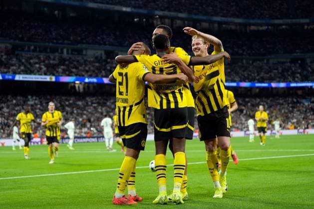 Jamie Bynoe-Gittens of Borussia Dortmund celebrares goal with his teammates Real Madrid v Borussia Dortmund, UEFA Champios League match, date 3. Football, Santiago Bernabeu Stadium, Madrid, Spain - 22 Oct 2024 Editorial use only  Copyright: xPressinphoto Shutterstockx 14806059q