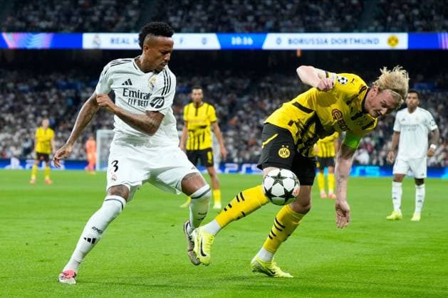 Eder Militao of Real Madrid CF and Julian Brandt of Borussia Dortmund Real Madrid v Borussia Dortmund, UEFA Champios League match, date 3. Football, Santiago Bernabeu Stadium, Madrid, Spain - 22 Oct 2024 Editorial use only  Copyright: xPressinphoto Shutterstockx 14806059k