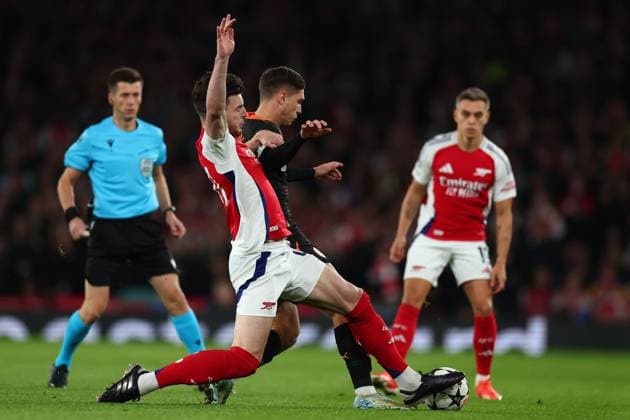 Heorhiy Sudakov of Shakhtar Donetsk is tackled by Declan Rice of Arsenal - Arsenal v Shakhtar Donetsk, UEFA Champions League, Emirates Stadium, London, UK - 22nd October 2024 Arsenal v Shakhtar Donetsk, UEFA Champions League, Group Stage, Football, Emirates Stadium, London, UK - 22 Oct 2024 EDITORIAL USE ONLY No use with unauthorised audio, video, data, fixture lists, club league logos or live services. Online in-match use limited to 120 images, no video emulation. No use in betting, games or single club league player publications.  Copyright: xMDI Shutterstockx 14805154p