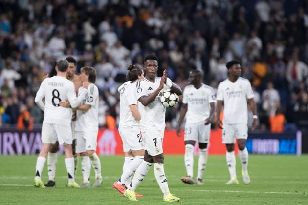 UEFA champions league - Real Madrid vs Borussia Dortmund MADRID, SPAIN - October 22:Vinicius jr of Real Madrid He takes the ball home after scoring three goals during the UEFA champions league 2024 25 match between Real Madrid and Borussia Dortmund at Santiago Bernabeu Stadium. (Photo by Guillermo Martinez) Madrid Santiago BernabÃ u Stadium Spain Copyright: xGuillermoxMartinezx