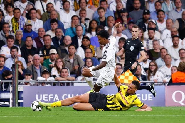 October 22, 2024, Madrid, Madrid, SPAIN: Rodrygo Goes of Real Madrid and Felix Nmecha of Borussia Dortmund in action during the UEFA Champions League 2024 25 League Phase MD3 match between Real Madrid CF and Borussia Dortmund at Estadio Santiago Bernabeu on October 22, 2024, in Madrid, Spain. Madrid SPAIN - ZUMAa181 20241022_zaa_a181_261 Copyright: xDennisxAgyemanx