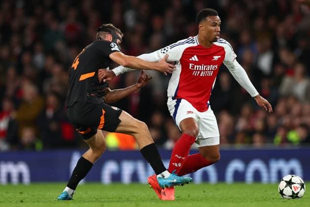 Gabriel of Arsenal under pressure from Danylo Sikan of Shakhtar Donetsk Arsenal v Shakhtar Donetsk, UEFA Champions League, Group Stage, Football, Emirates Stadium, London, UK, 22 Oct 2024 EDITORIAL USE ONLY No use with unauthorised audio, video, data, fixture lists, club league logos or live services. Online in-match use limited to 120 images, no video emulation. No use in betting, games or single club league player publications.  Copyright: xSimonxDael Shutterstockx 14801590bs