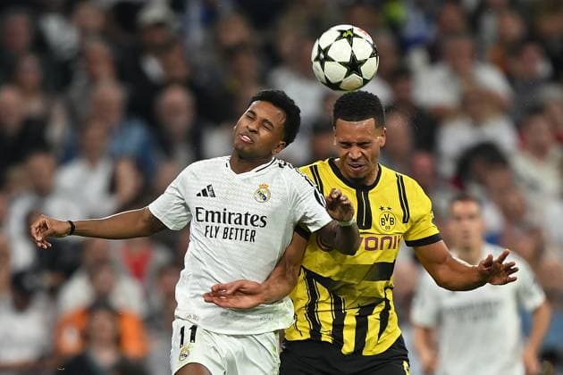 Madrid, Estadio Santiago Bernabeu, 22.10.24, GER, Herren, UEFA Champions League, Saison 2024-2025, Real Madrid - Borussia Dortmund Bild: v.li. im Zweikampf RODRYGO (Real Madrid) und Felix NMECHA (Dortmund) im Kopfball, Kopfballduell Only for editorial use! UEFA regulations prohibit any use of photographs as image sequences and or quasi-video. Spanien