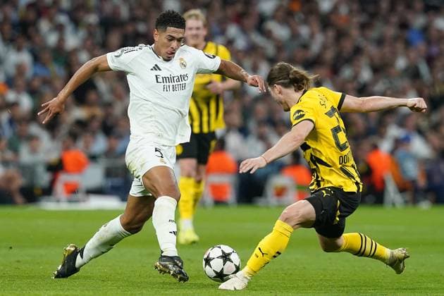 Champions League - Real Madrid v Borussia Dortmund Real Madrid CF s Jude Bellingham (l) and Borussia Dortmund s Marcel Sabitzer during Champions League match Real Madrid v Borussia Dortmund on October 22, 2024 in Madrid, Spain. Photo by Acero AlterPhotos ABACAPRESS.COM Madrid Spain  Copyright: xAcero AlterPhotos ABACAx
