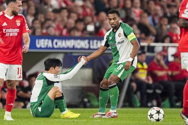 UEFA Champions League: SL Benfica v Feyenoord Lisbon - In-beom Hwang of Feyenoord, Quinten Timber of Feyenoord during the third round of new format of the UEFA Champions League 2024 2025. The match is set between SL Benfica and Feyenoord at Estadio da Luz on 23 October 2024 in Lisbon, Portugal. Copyright: xTomxBodex