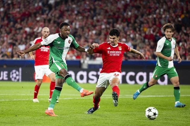 LISSABON - Antoni Milambo of Feyenoord scores the 0-2, Tomas Araujo of Benfica during the UEFA Champions League match between Benfica and Feyenoord at Estadio do Benfica on Oct. 23, 2024 in Lisbon, Portugal. ANP KOEN VAN WEEL UEFA Champions League 2024 25 League Phase MD3 2024 25 xVIxANPxSportx xxANPxIVx 511654401 originalFilename: 511654401.jpg