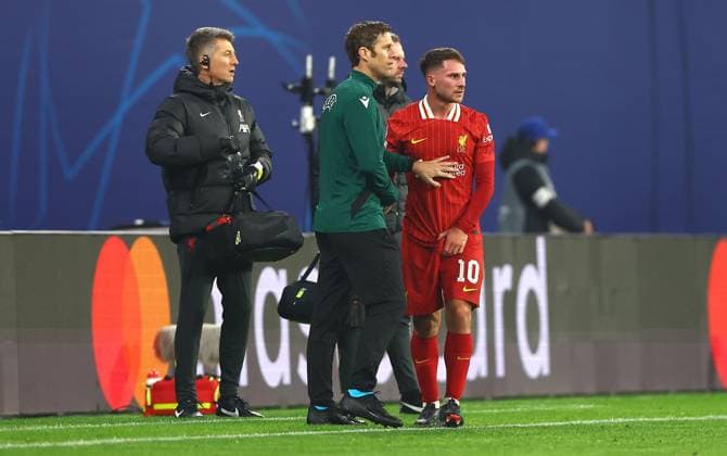 Alexis Mac Allister of Liverpool feels the pain from an injury RB Leipzig v Liverpool, UEFA Champions League, Group Stage, Football, Red Bull Arena, Leipzig, Germany, 23 Oct 2024 EDITORIAL USE ONLY No use with unauthorised audio, video, data, fixture lists, club league logos or live services. Online in-match use limited to 120 images, no video emulation. No use in betting, games or single club league player publications. Copyright: xKieranxMcManus Shutterstockx 14801646aj