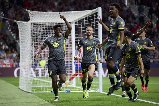 Jonathan David of Lille OSC celebrates with his team mates after scoring his team s third goal during the UEFA Champions League match between Atletico de Madrid v LSCO Lille at Riyadh Air Metropolitano Stadium on October 23, 2024 in Madrid (Photo by: LGM) FOOTBALL : Atletico de Madrid vs LSCO Lille - UEFA Ligue des Champions - 23 10 2024 LGM Panoramic 